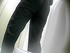Mature woman squats over toilet to piss