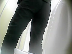Mature woman squats over toilet to piss