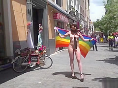 Naked brunette walking flag in public