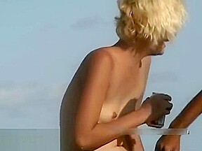 Naked hotties followed around by a nude beach