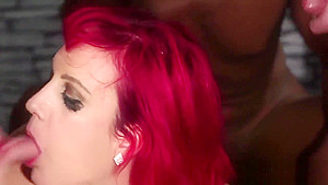 Nasty beauty gets cumshot on her face eating all the juice