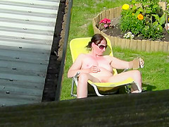 Neighbour naked sunbathing