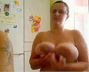 Nerdy slut shows her big round tits on veb chat