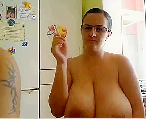 Nerdy slut shows her big round tits on veb chat