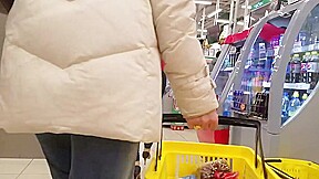 Nice round ass in supermarket