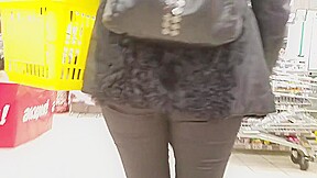 Nice round ass in supermarket