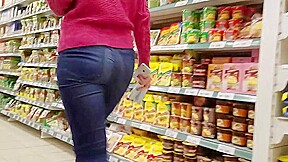 Nice round ass in supermarket