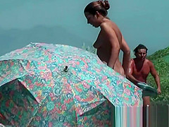 Nude beach spies on a perky breasted nudist