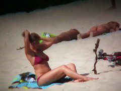 Nudist beach shoots naked babes sunbathing