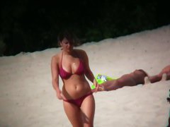 Nudist beach shoots naked babes sunbathing