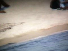 Nudist beach shoots naked babes sunbathing