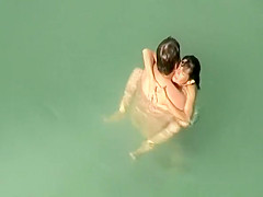 Nudist sex in the water