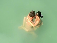 Nudist sex in the water