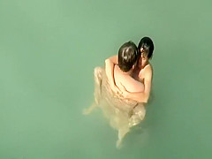Nudist sex in the water