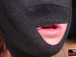 Obedient BDSM masked babe gets whipped by CMNF master