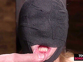 Obedient BDSM masked babe gets whipped by CMNF master