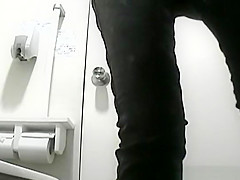Oriental women peeing in toilet