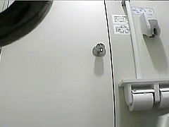 Oriental women peeing in toilet