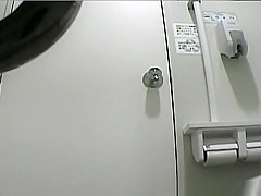 Oriental women peeing in toilet