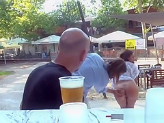 Petite Euro slave sucking in public
