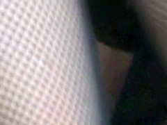 Pretty dark pussy exposed under a skirt