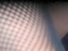 Pretty dark pussy exposed under a skirt