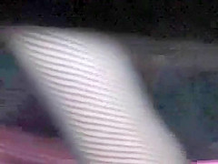 Pretty dark pussy exposed under a skirt