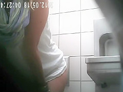Pretty ladies spied in a public toilet