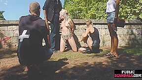 Public deepthroating BDSM slut sucks 2 cocks outdoor