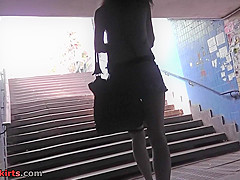 Redhead skank in mini denim skirt in upskirt video