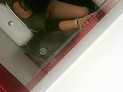 Saucy babe gets her pussy hammered in a public toilet