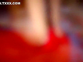 Secretary in sexy red pumps in the office