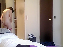 Secretly filming a milf in a hotel room