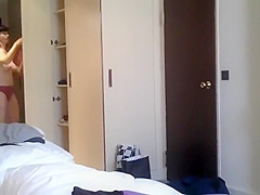 Secretly filming a milf in a hotel room