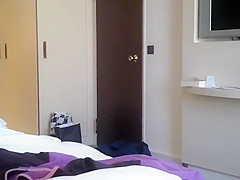 Secretly filming a milf in a hotel room