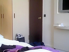 Secretly filming a milf in a hotel room