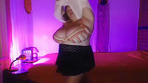 Seductive busty huzzy is fingering her twat