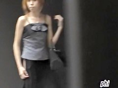 Sharking of a stunning slender girl on streets of Japan