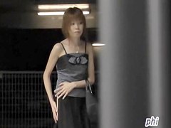 Sharking of a stunning slender girl on streets of Japan