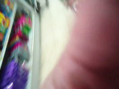 Short haired MILF gives up an up skirt view of her butt