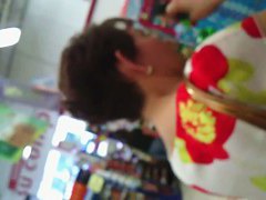 Short haired MILF gives up an up skirt view of her butt