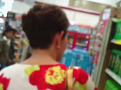 Short haired MILF gives up an up skirt view of her butt