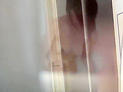 Showering asian ho rubs