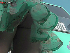 Skinny ass and g-string of a brunette in upskirt mov