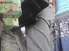 Skinny ass and g-string of a brunette in upskirt mov