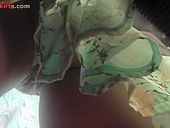 Skinny ass and g-string of a brunette in upskirt mov