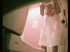 Slim girl in thong pissing was shot on the