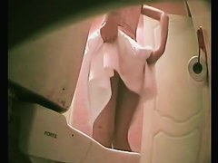 Slim girl in thong pissing was shot on the