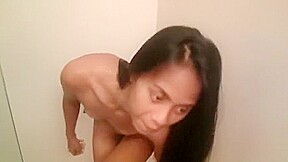 Small Filipino girl, showers and shaves her pussy