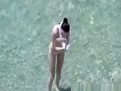 Small breasts woman fucked in rocky beach